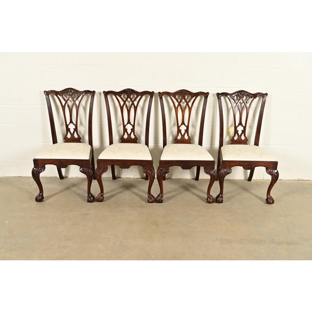 An outstanding set of four Chippendale or Georgian style dining chairs By Drexel Heritage USA, 1992 Carved solid mahogany...