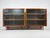 This listing is of a pair of classic Mid-Century Modern display cabinets. Clean simple shapes, wide front profile frames,...