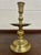 This is a gorgeous antique brass candlestick or chamberstick. Features a turned baluster stem, wide circular drip pan, and...