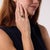 This elegant vintage sapphire and diamond ring is a sophisticated 1980’s design, centered by a GIA-certified emerald cut...