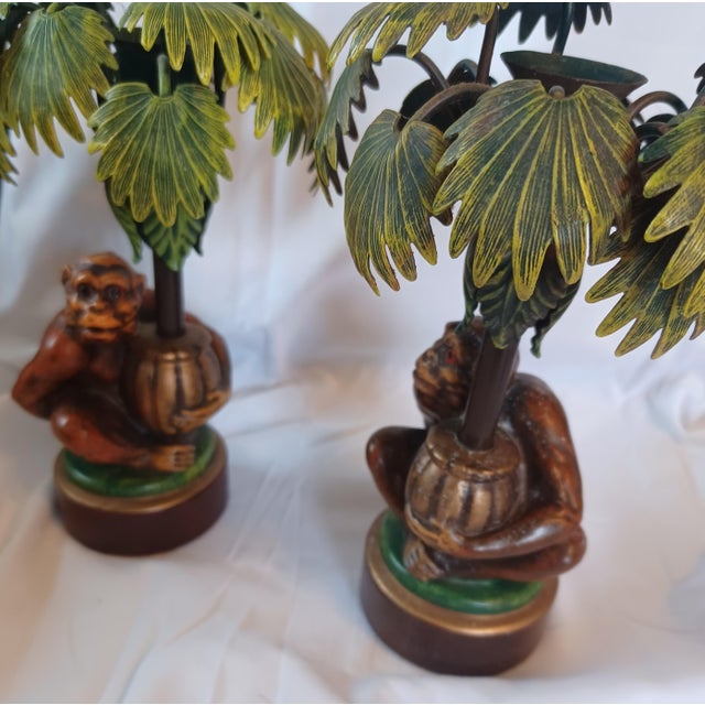 A Pair Of monkey and palm tree candle holders. so unusual, Hollywood or Palm Beach regency style.
