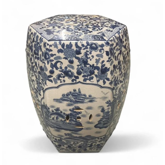 This elegant vintage garden stool is a classic and versatile accent piece. Crafted from porcelain, the hexagonal stool is...