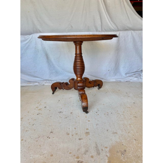 Found in the South of France, this 19th Century French Walnut Louis Philippe Style Pedestal Table dates back to the mid...
