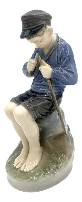 Danish Porcelain Figurine of a Boy With a Stick from Royal Copenhagen