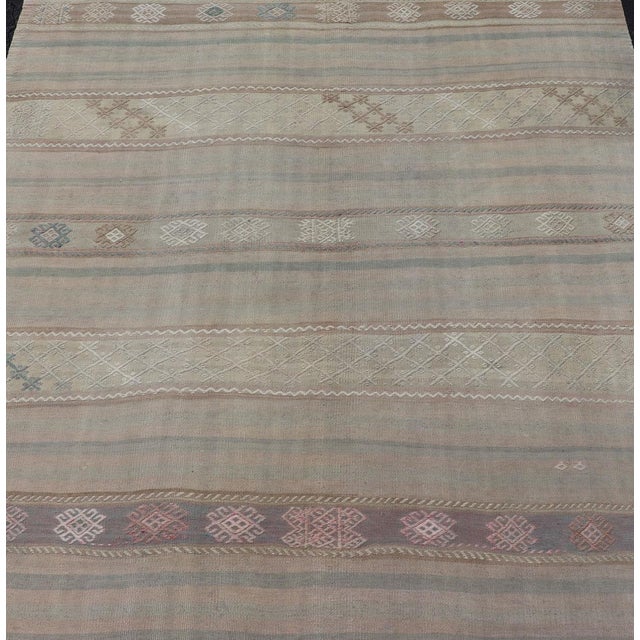 Flat-Weave Turkish Kilim With Embroideries in Earthy Tones and Hints of Pink 5'8" X 10'8" For Sale - Image 4 of 12