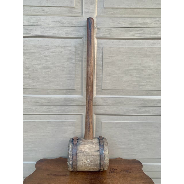 A rare and unique antique rustic industrial hand made wooden and wrought iron commercial builder's or carpenter's mallet....