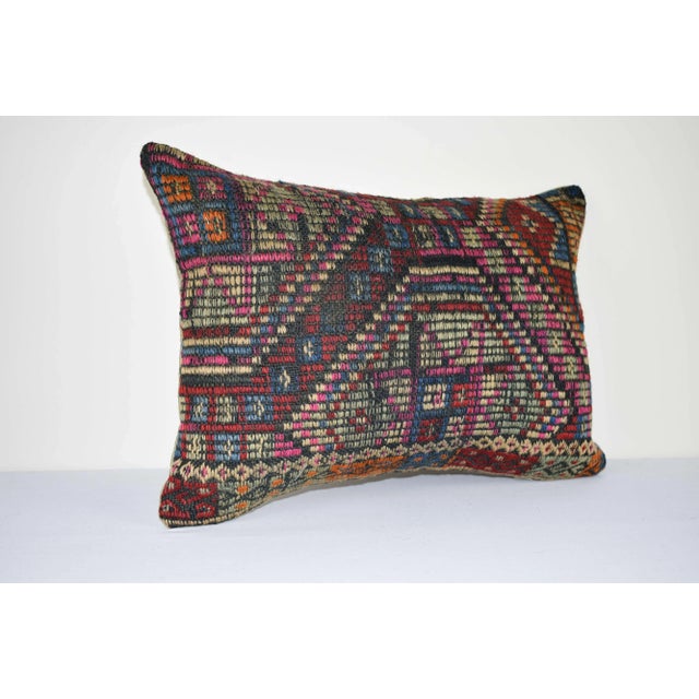 This handwoven kilim pillow is made from Anatolia and Middleast Kilim fragments. Each of our kilim pillow cover is cut...