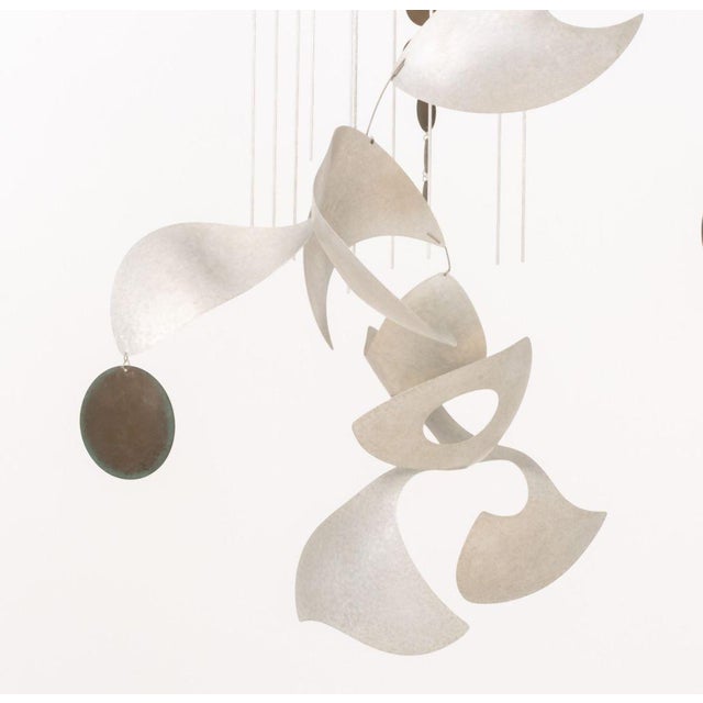 American Modernist Abstract Mobile, silver-tone metal, probably aluminum. 37" H x 31" Diameter. Provenance: From a Warren,...