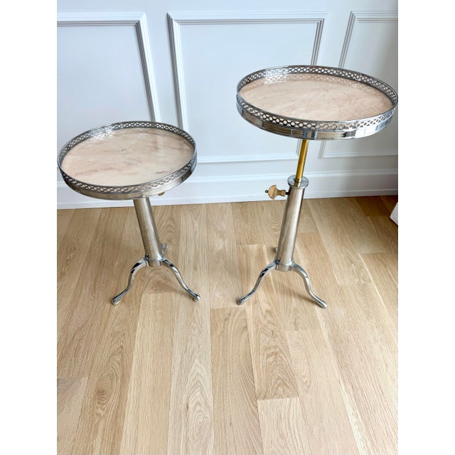 Elegant pair of French Jansen-style drink/guéridon tables, dating to the 1970s, in the refined neoclassical aesthetic...