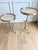 Elegant pair of French Jansen-style drink/guéridon tables, dating to the 1970s, in the refined neoclassical aesthetic...