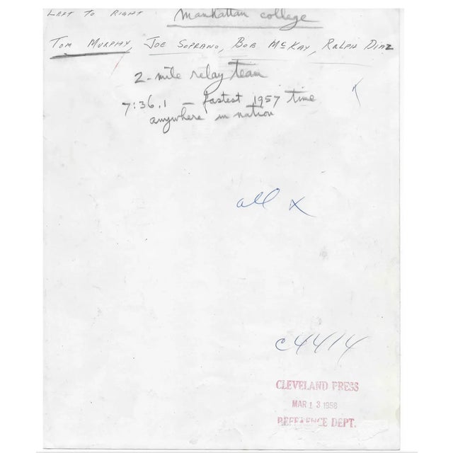 1958 photo of the Manhattan College two mile relay team circa 1957. Publication information and names of the runners (Tom...