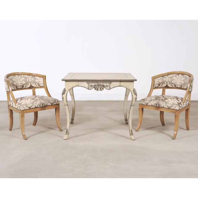 An elegant Beauvais game table or center table designed by Dennis & Leen, Hollywood, CA. The square table executed in a...