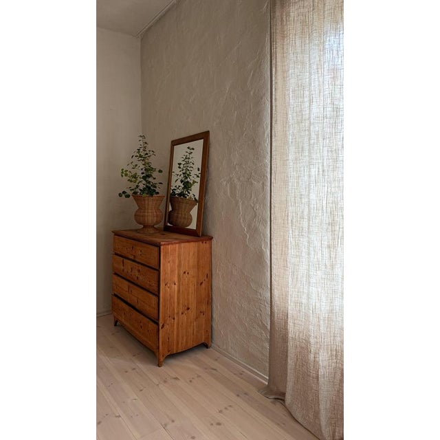 Wonderful organic wall mirror produced in Sweden in the 1960s. Made of sculpted oak and crystal mirror glass. Even with...