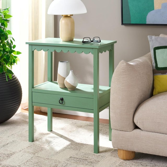 Bring understated elegance to your home with the Haven Low Drawer Accent Table in a warm sage green finish. This...