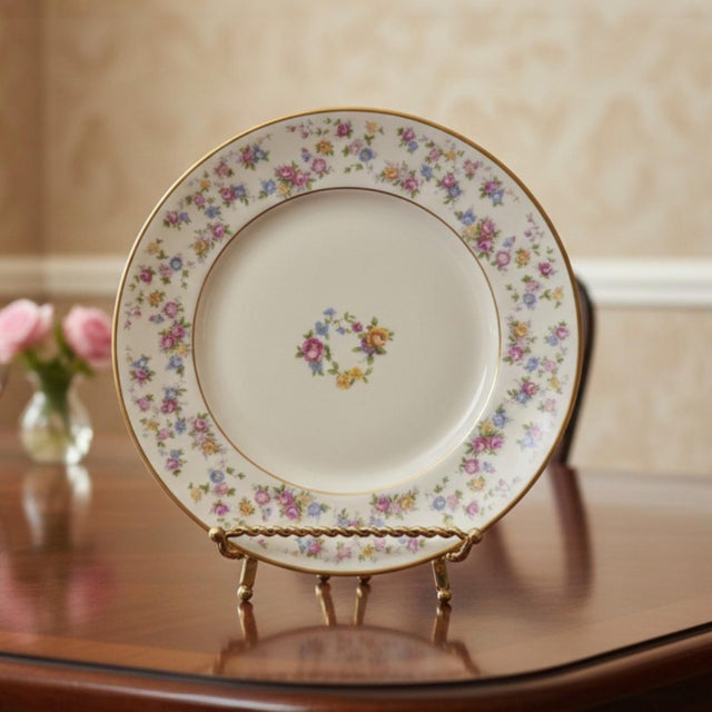 This set of twelve porcelain salad plates is from the Reverie pattern by Lamberton, an American manufacturer known for...