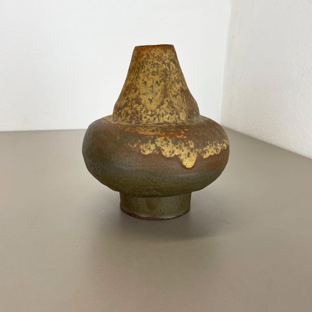 Article: Fat lava art vase. Model: 816-1. Producer: Ruscha, Germany. Decade: 1970s. This original vintage vase was...