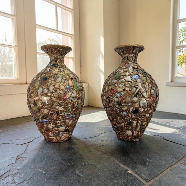 Authentic monumental matched pair of California memory ware mosaic floor vases constructed upon original Steiger Terra...