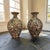 Authentic monumental matched pair of California memory ware mosaic floor vases constructed upon original Steiger Terra...