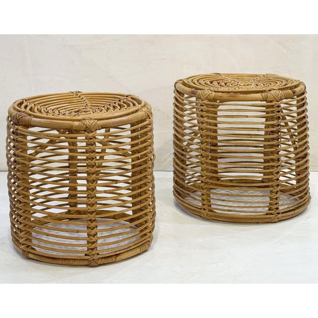 A beautiful vintage Spanish handwoven rattan or wicker cane stool or seat from the Mid-Century Modern period, featuring a...