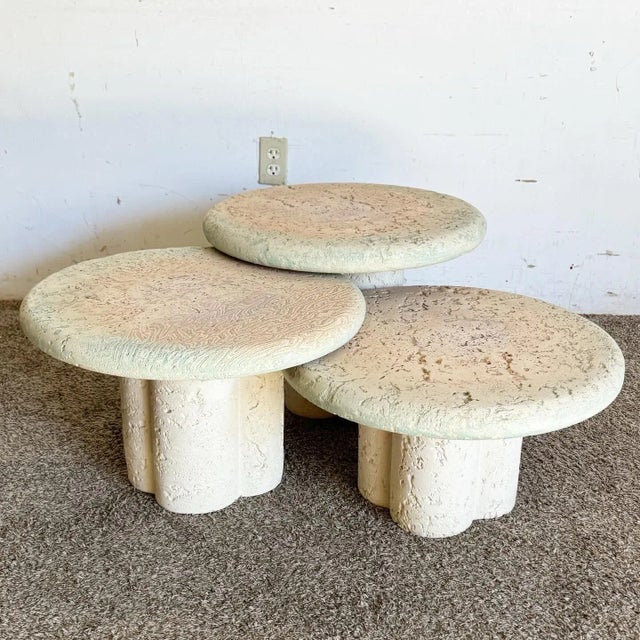 Embrace the unique charm of these Postmodern Faux Coquina Coral Mushroom Nesting Tables. This set of three tables features...
