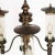 This set of two sconces and one chandelier is made from burnished brass. The lights have been rewired and are in...