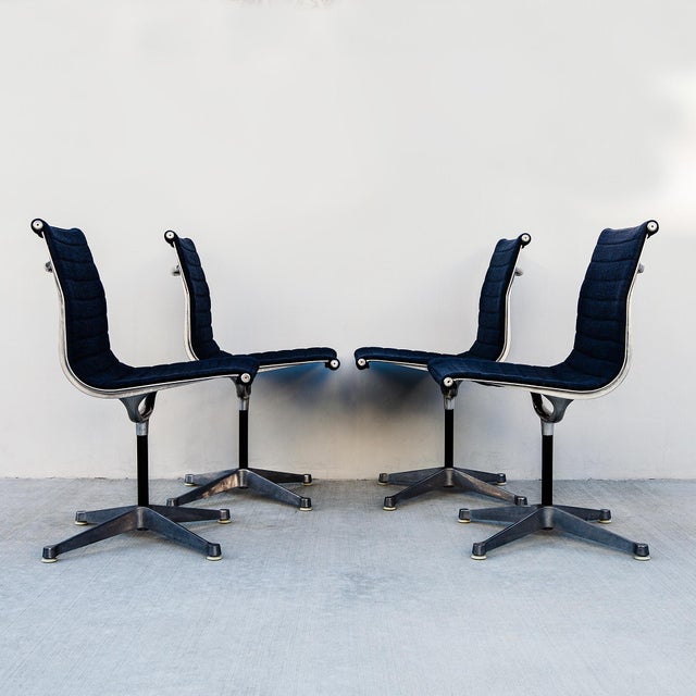 Rare set of four first generation Eames Aluminum Group side chairs with four star base by Herman Miller. Introduced in...