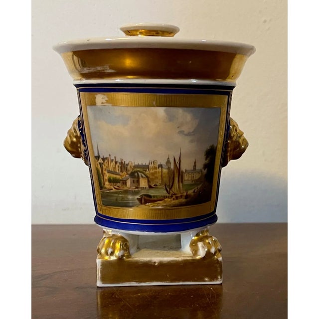 Antique early 19th century Paris porcelain bough pot decorated with a landscape scene on a deep blue ground enhanced by...