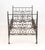 French Wrought Iron Folding Campaign Bed, with scroll form motif on casters. 40.25" H x 33.5" W x 75.5" D. Provenance:...