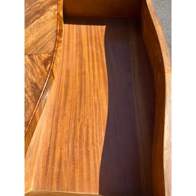 French two drawer chest of drawers with great color and silver colored ormolu