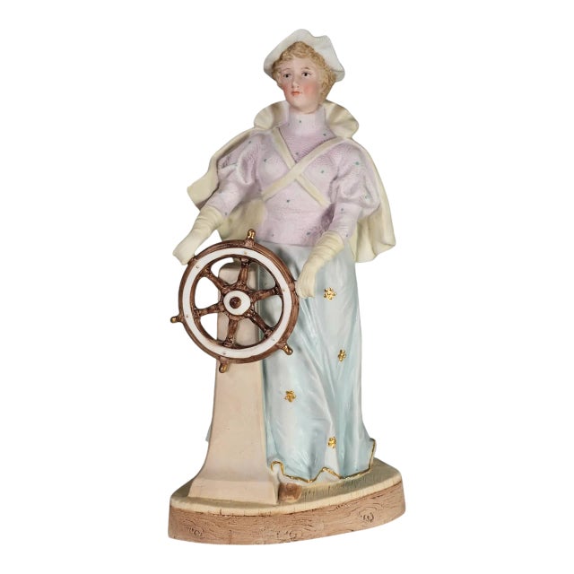 Gebruder Heubach Young Lady at a Ship’s Steering Wheel Figurine For Sale