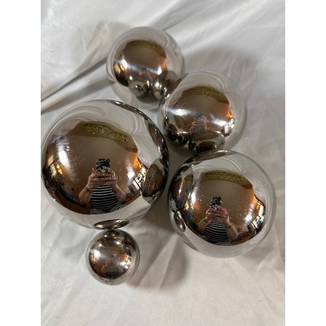 Very cool stainless steel orbs in three different sizes. Use them to decorate the garden or put it in a bowl in the house.