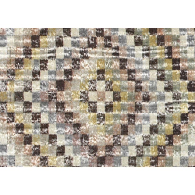 This vintage Turkish mid-century modern rug is expertly handwoven with wool on a cotton foundation in the Sparta region of...