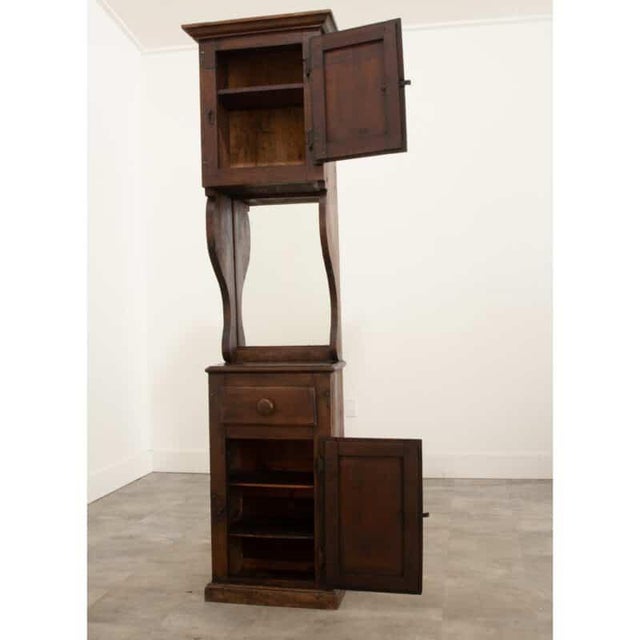 Dimensions: 80-⅜”H x 21”W x 13-¼”D This unique storage unit was handcrafted in England during the 1780s from solid oak,...