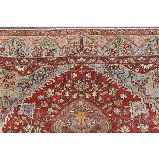Antique Persian Bakhtiari Rug With Red Field and Blue Medallion Design For Sale - Image 10 of 16