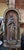 A carved wooden devotional statue of the Virgin Mary with the Sorrowful and Immaculate Heart, displayed in an...