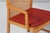 Ditte Heath armchairs in elm. with cane in the back Original upholstered with red leather. Made by Søren Horn This piece...