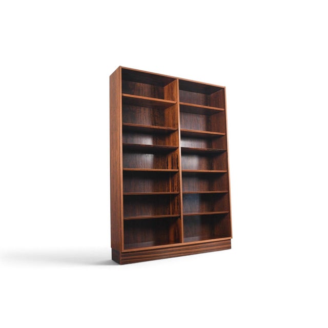 This is the first of a matching set of double bookcases designed by Carlo Jensen and produced by Hundevad and Co in...