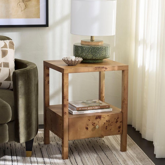 Experience the unique blend of style and function that forms the WILLSHINE 1 DRAWER ACCENT TABLE. This exquisite piece...