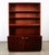 Danish Modern Rosewood 2 piece cabinet with shelving above. This piece was produced in the 1960s and was acquired from the...
