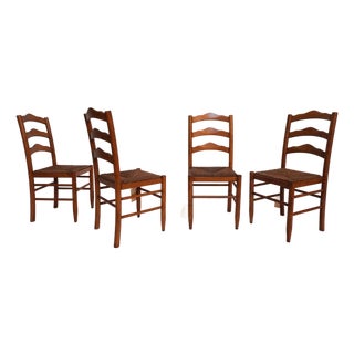 Mid 20th Century Set of Four Wooden Dining Chairs With Rush Seats For Sale