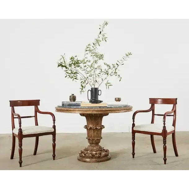 Dramatic neoclassical style round center table crafted by Hendrix Allardyce in Los Angeles, CA. The Tivoli table features...