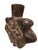 The sculptural design features a stylized Andean ceremonial figure with an elaborate headdress, expressive facial...
