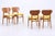 Beautiful set of four vintage teak chairs from the 1960s with a clean, sleek form and understated Danish lines. The teak...