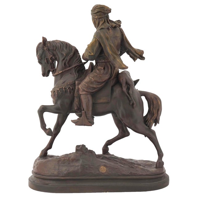 A magnificent and finely detailed late 19th-century Orientalist sculpture titled "Le Cavalier Arabe" (The Arab Rider)....