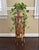 Bring organic warmth and vintage character to your space with this stunning mid-20th-century bamboo pedestal stand....