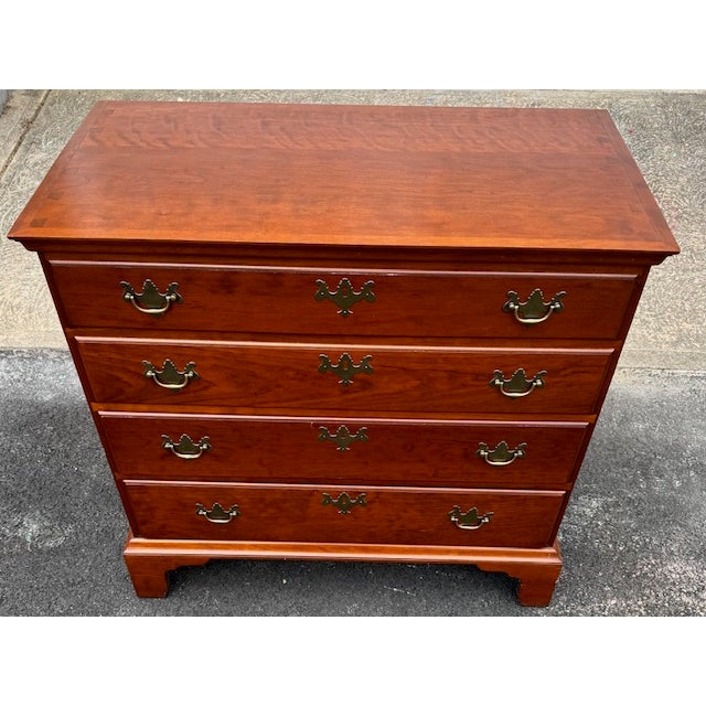 Handsome high quality solid cherry hand made 4 drawer Chippendale style chest of drawers made by Eldred Wheeler of...