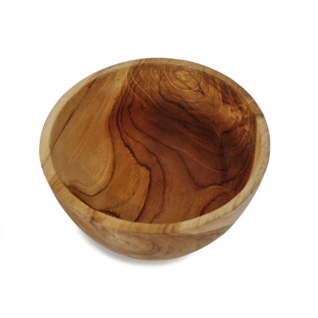 Simple smooth two tone teak wood bowl. Each unique in beautiful natural tones and grain. Each is sold individually.