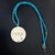 This Turquoise See The Good Necklace is a beautiful and meaningful piece of handmade jewelry that combines the vibrant...