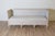 A stunning 19th-century Swedish sofa, circa 1800, crafted in the neoclassical tradition. This elegant piece is constructed...