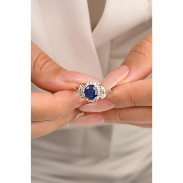 This is part of Chairish’s Fine Jewelry assortment. Exquisite Blue Sapphire and Diamond Engagement Ring in 14K Gold...